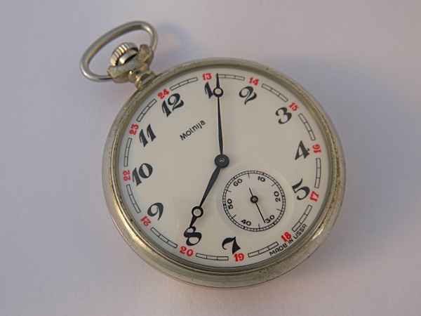 A photo of a Molnija pocket watch taken in our home made light chamber